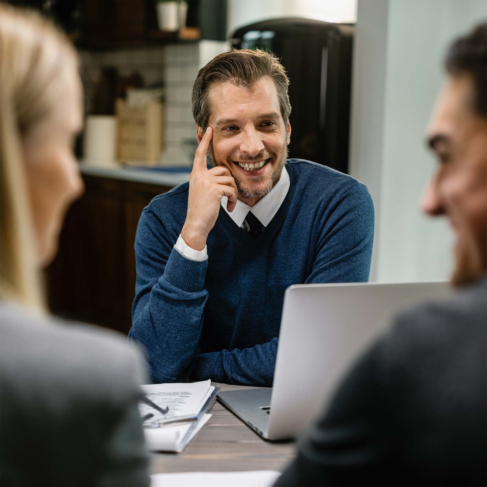 Success & Wellbeing Service Page Executive Therapy & Coaching Offers Telehealth in New York, Massachusetts & Maine image of man smiling with colleagues