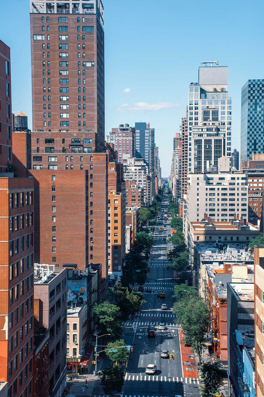 A street lined with tall buildings.