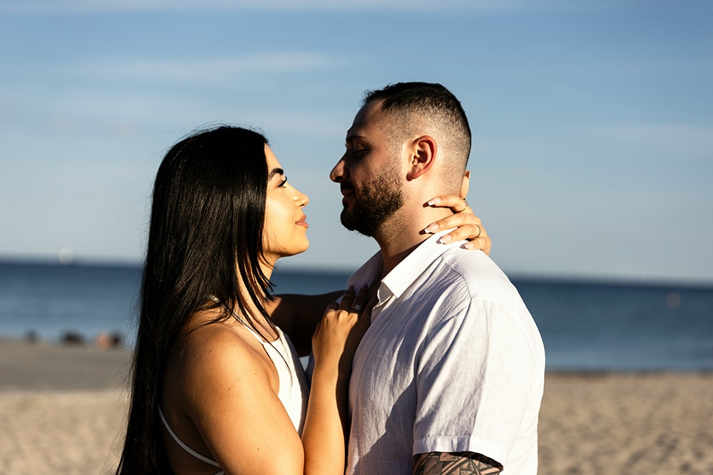 Man and woman standing on a beach